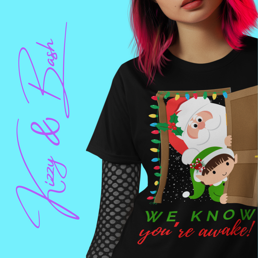Funny Santa and Elf Christmas Shirt “We Know You’re Awake!” Doorway Peeking Design Holiday Graphic Tee for Him or Her Adult Unisex Jersey Short Sleeve Tee