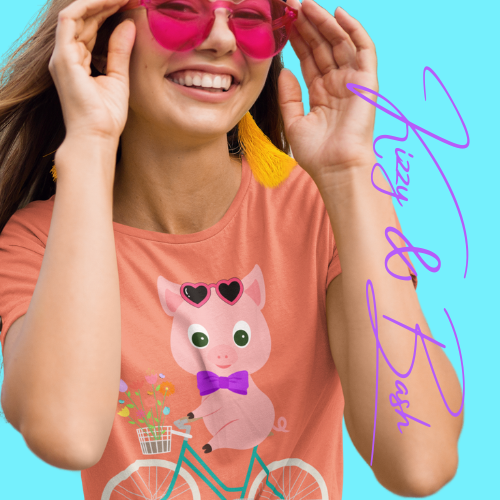 Cute Pig on Bicycle T-Shirt Whimsical Farmcore Graphic Tee Spring Piggy Shirt Gift for Pig Lovers Cute Farm Animal Shirt Spring Gift for Friends and Family Adult Unisex Jersey Short Sleeve Tee