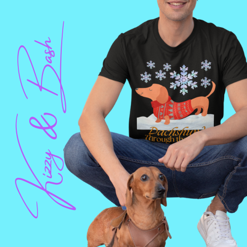 Christmas Wiener Dog T-Shirt for Adults Dachshund Through the Snow Holiday Shirt for Dog Lovers Cute Dog Christmas Shirt Perfect Gift for Pun Lovers Unique Gift for Dog Mom or Dog Dad Unisex Heavy Cotton Tee